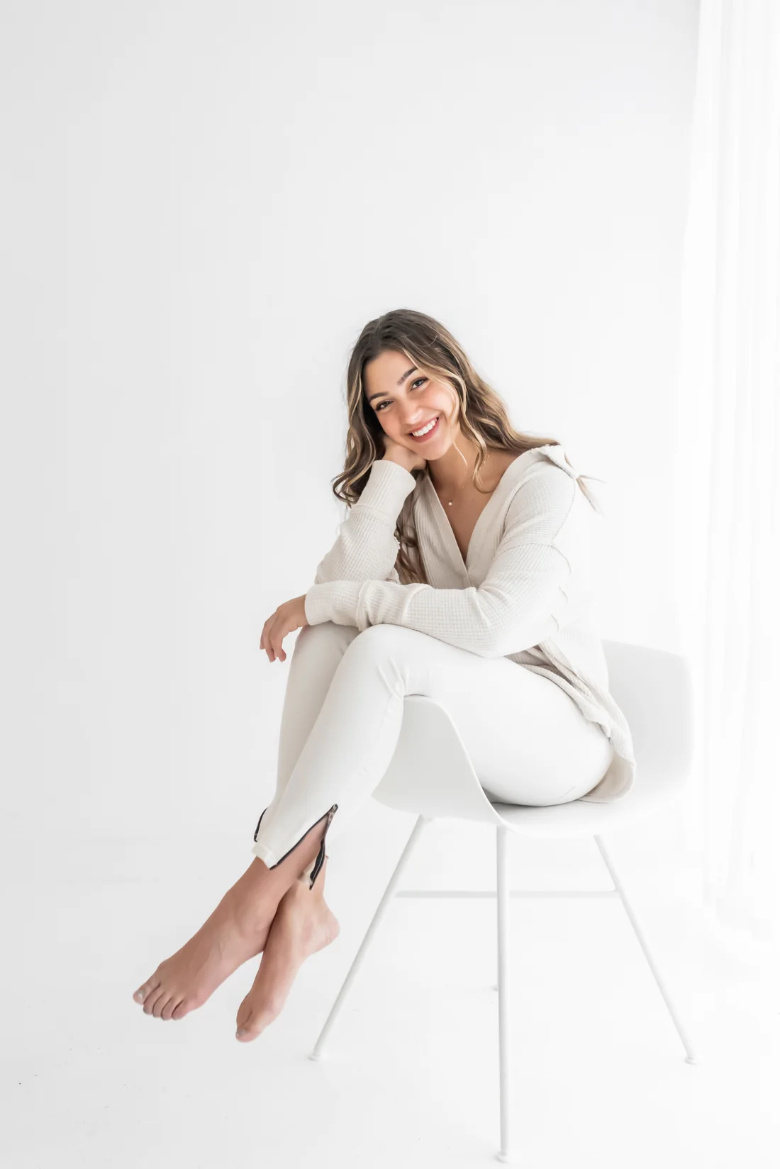 Professional seated portrait of Alexa Davison